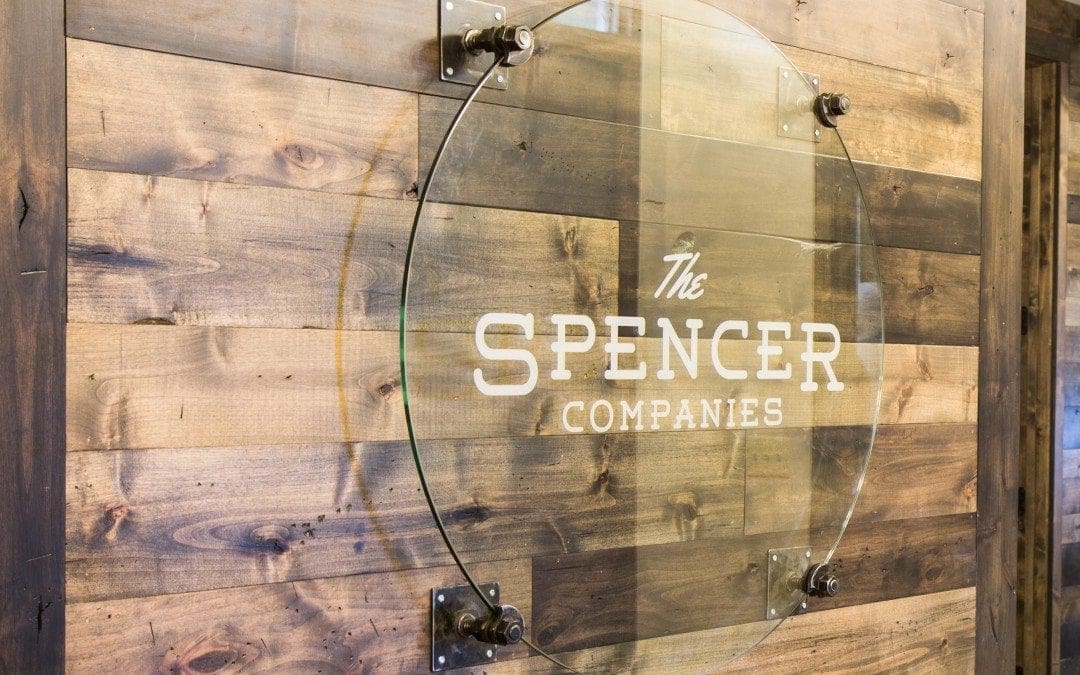 The Spencer Companies Glass Logo